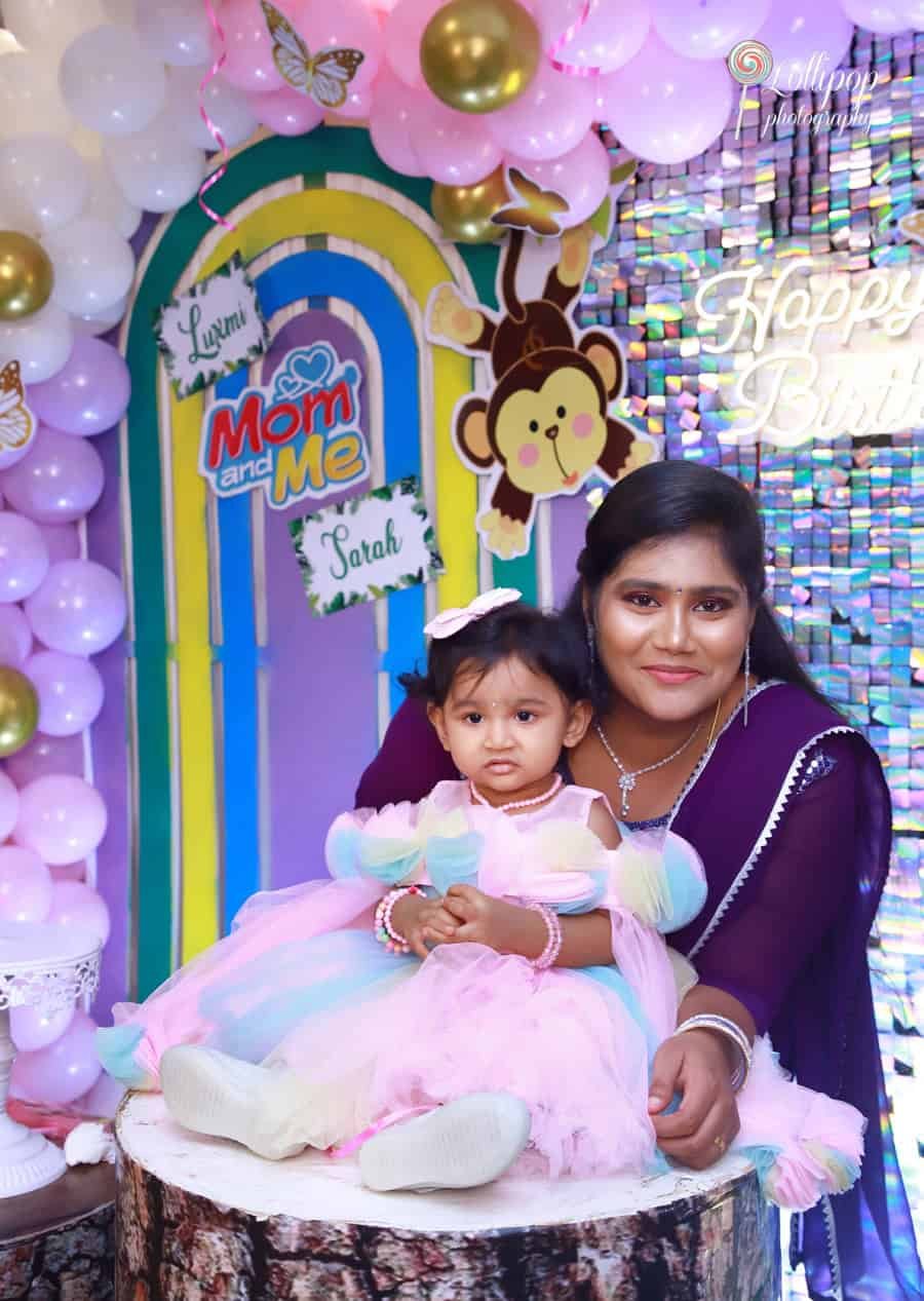 Sarah with her mother, capturing a precious moment at her birthday celebration by Lollipop Photography.