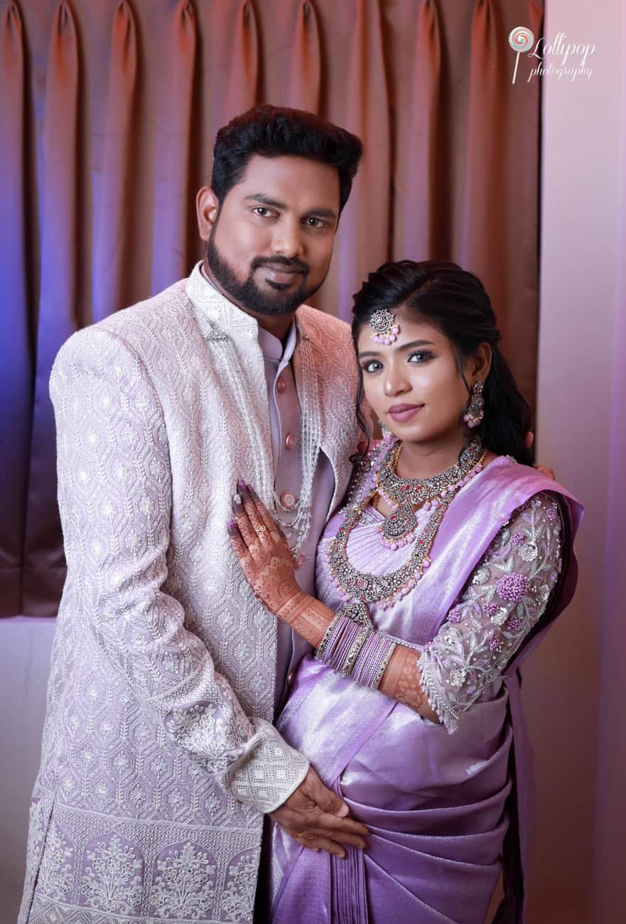 Suganthi and her husband embrace, sharing a warm moment at their baby shower celebration in Chennai, captured by Lollipop Photography